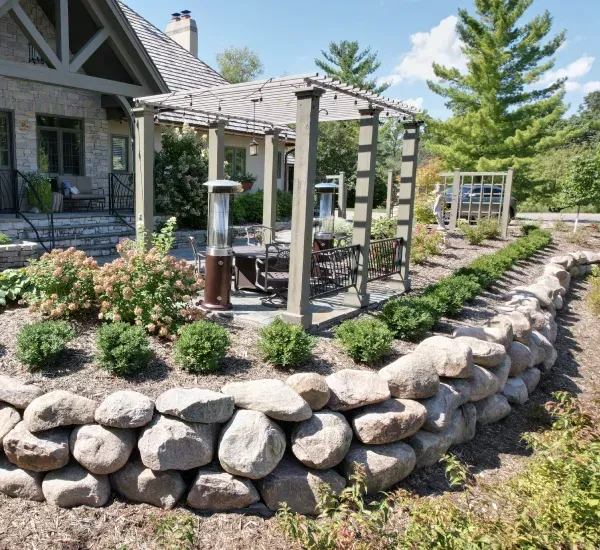 New construction landscape installation in Loretto MN delivering finished outdoor spaces with plants and design elements