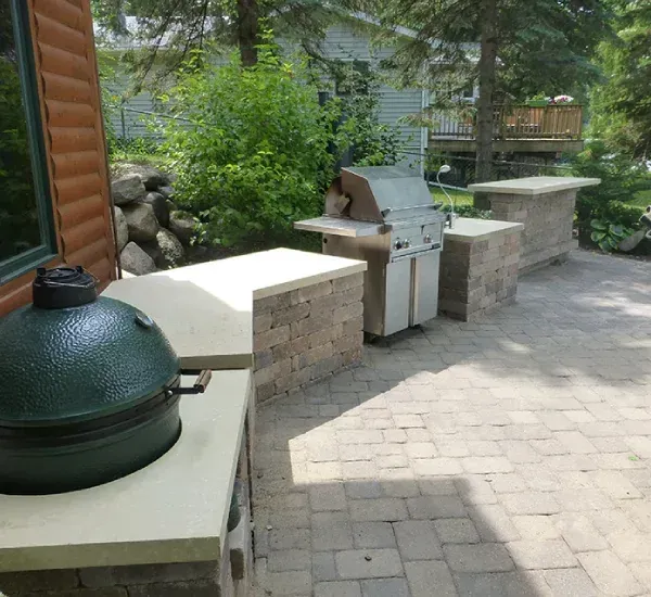 Outdoor kitchen installation in Loretto MN creating functional and stylish backyard cooking and entertaining spaces