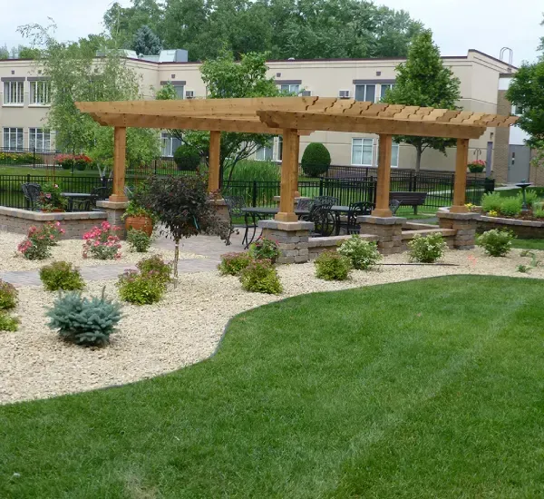 Pergola installation services in Loretto MN creating shaded and stylish outdoor living spaces for residential properties