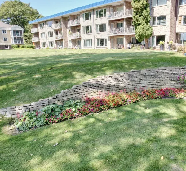 Spring and fall landscape cleanup in Loretto MN preparing lawns and gardens for seasonal changes