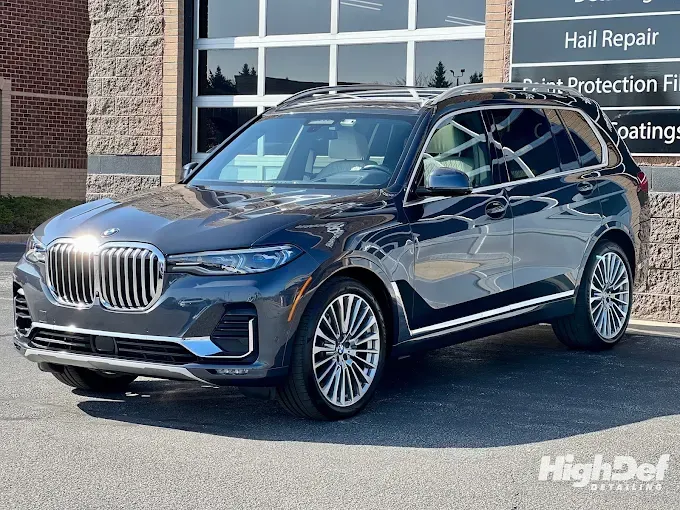 Black BMW X7 with auto window tinting and paint protection film