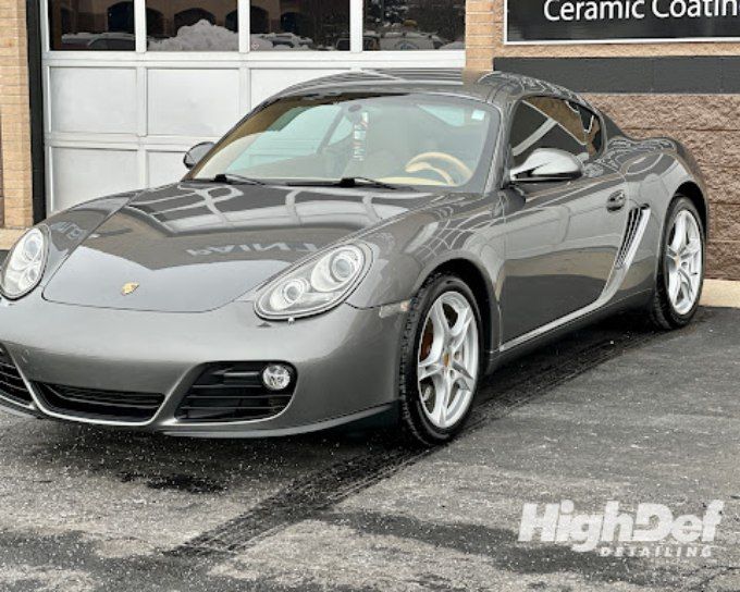 Gray Porsche Cayman with paint protection film in Goshen shielding it from fall harvest road debris