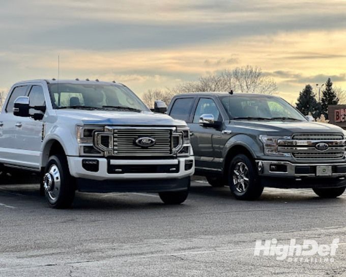 White Ford Super Duty and gray F-150 pickups showing truck paint protection film coverage options