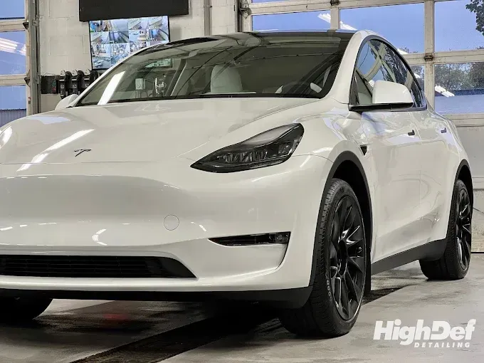 White Tesla Model Y with paint protection film and ceramic coating