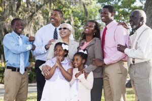 Family dressed nicely posing for a picture