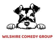 Schnauzer dog peeking over a line with