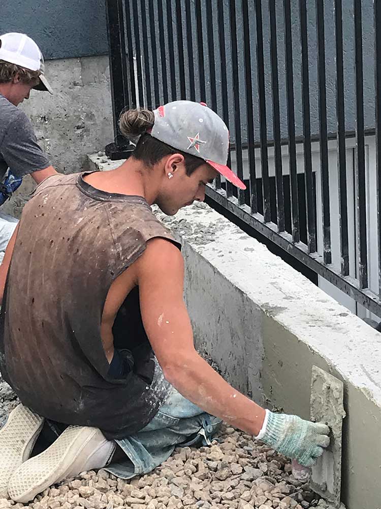 Worker Doing Foundation Plastering Services — Layton, UT — H & C Foundation Plastering