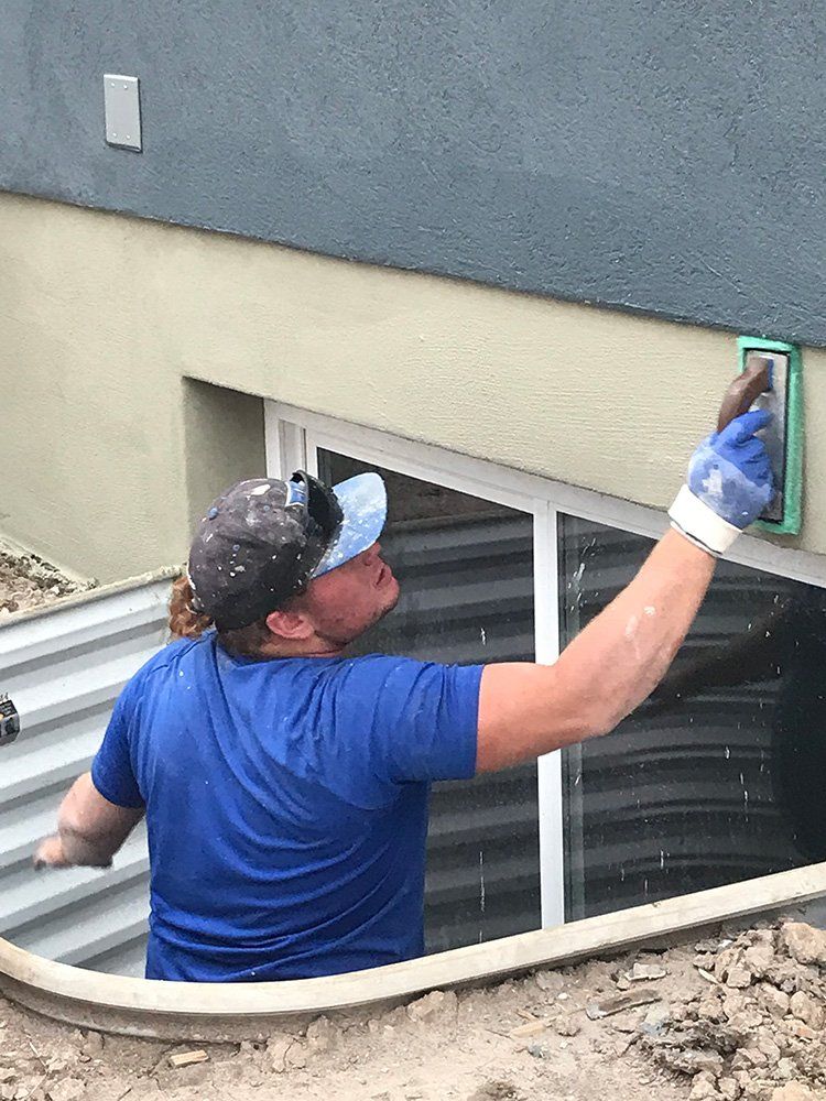 Man Plastering the House Wall — Layton, UT — H & C Foundation Plastering