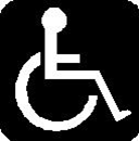White wheelchair accessibility symbol on a black background