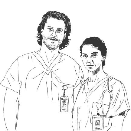 Two healthcare workers in scrubs wearing ID badges, standing side by side and facing forward.