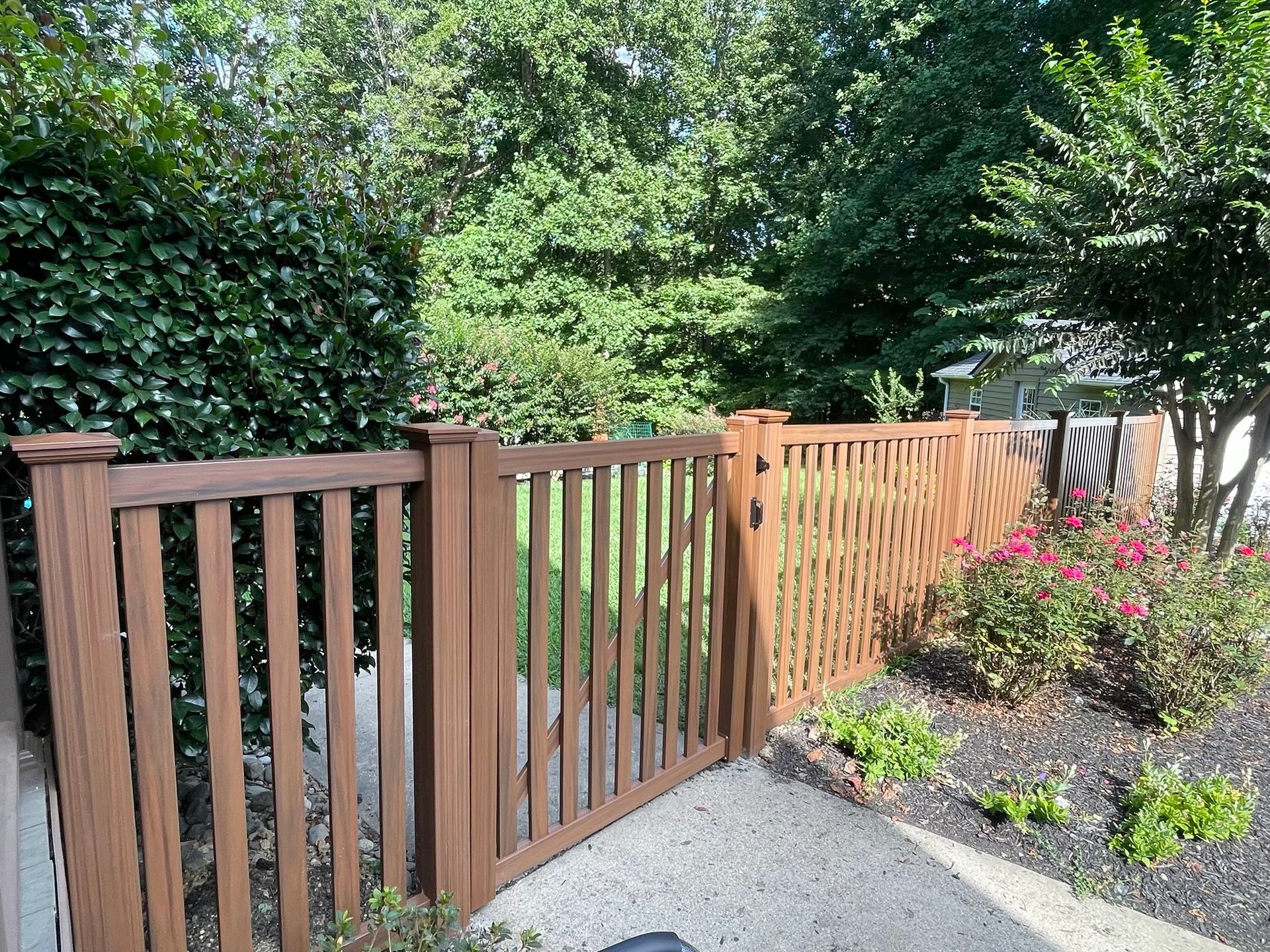 Wood look vinyl fence