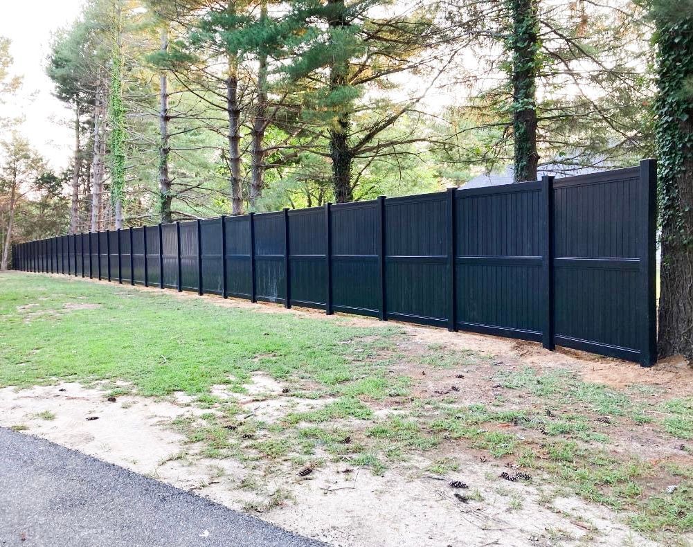 Brown vinyl privacy fence