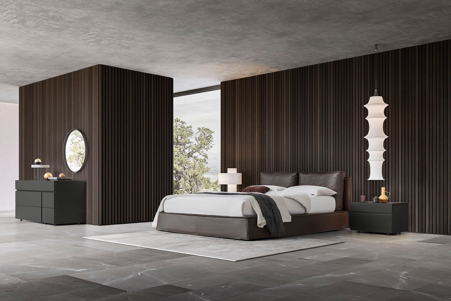 Camera da letto moderna con letto grigio, pannelli in legno scuro e pavimento in cemento.