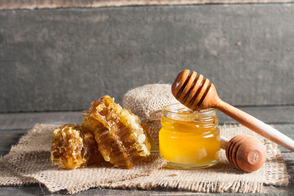 There Is A Jar Of Honey And Honeycomb On The Table — McGrath Meats In Taree, NSW