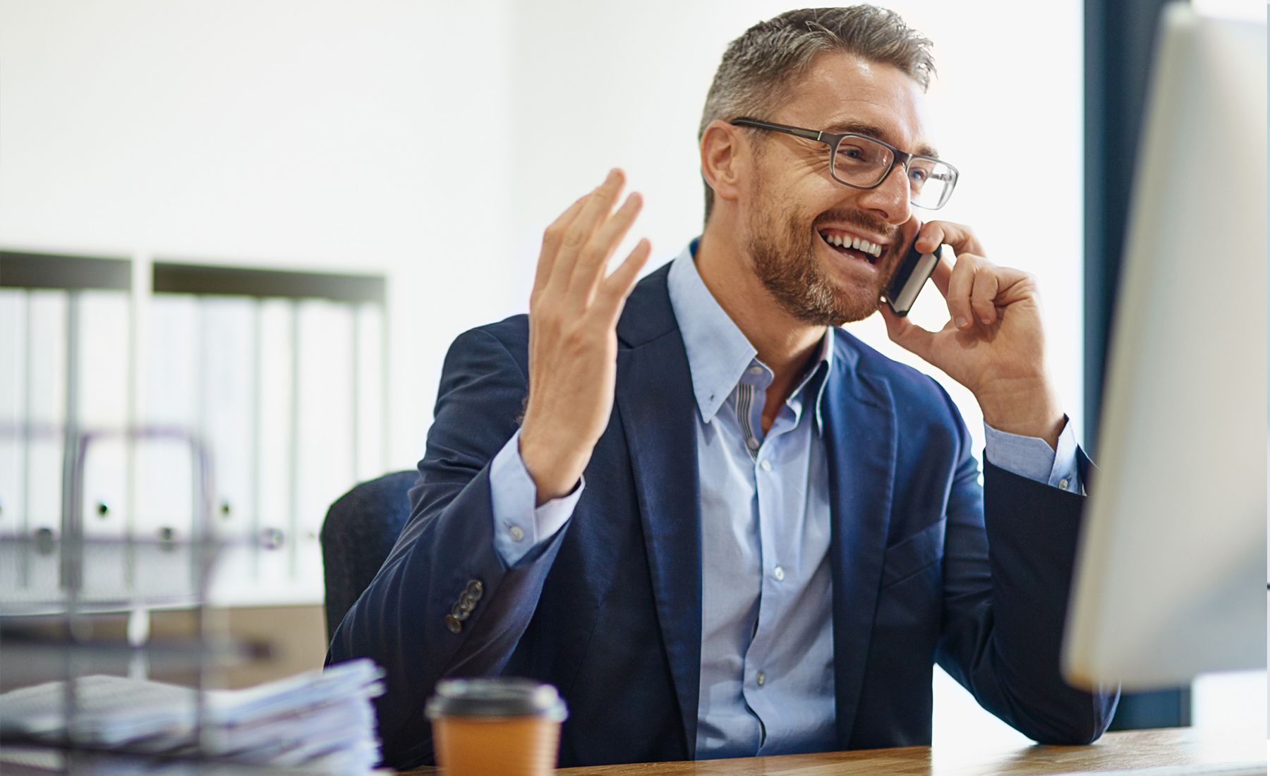 businessman discussing the advantages of business voip phone systems with the prospect