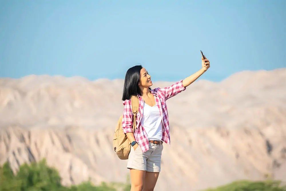 Woman taking selfie