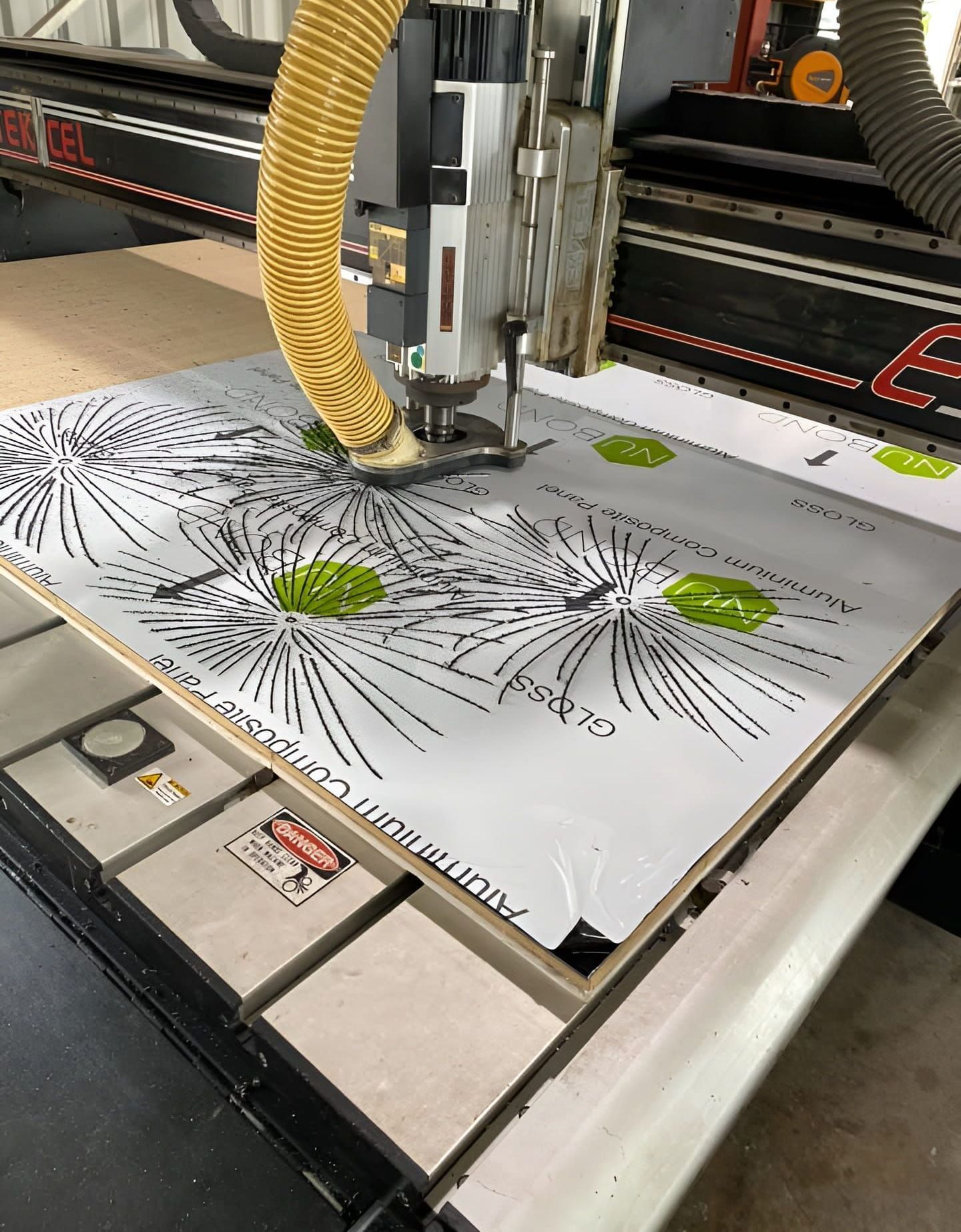 A Machine Is Cutting a Piece of Wood on A Table — Advanced Poly in Yarrawonga, NT