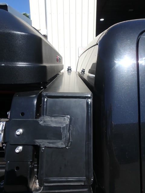 A Black Car with A Roof Box Attached to It — Advanced Poly in Yarrawonga, NT