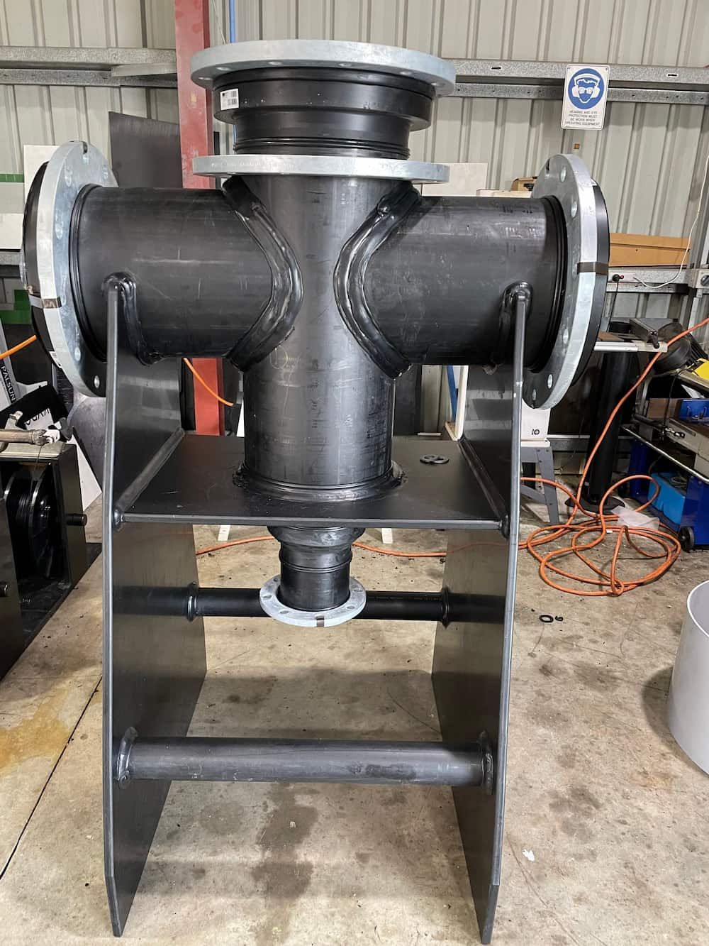 A Large Black Pipe Is Sitting on Top of A Metal Stand — Advanced Poly in Yarrawonga, NT