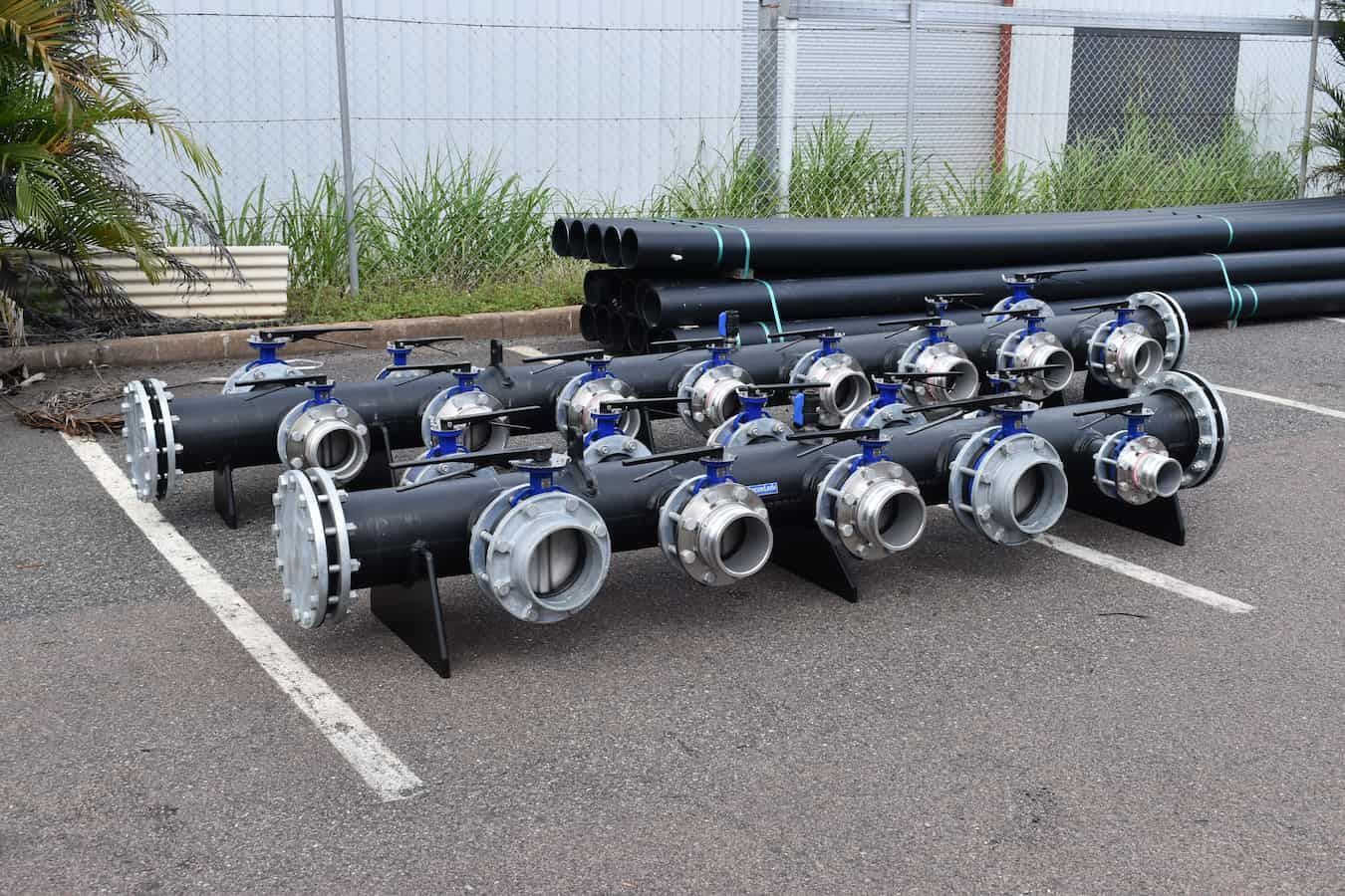 A Bunch of Pipes Are Stacked on Top of Each Other — Advanced Poly in Yarrawonga, NT