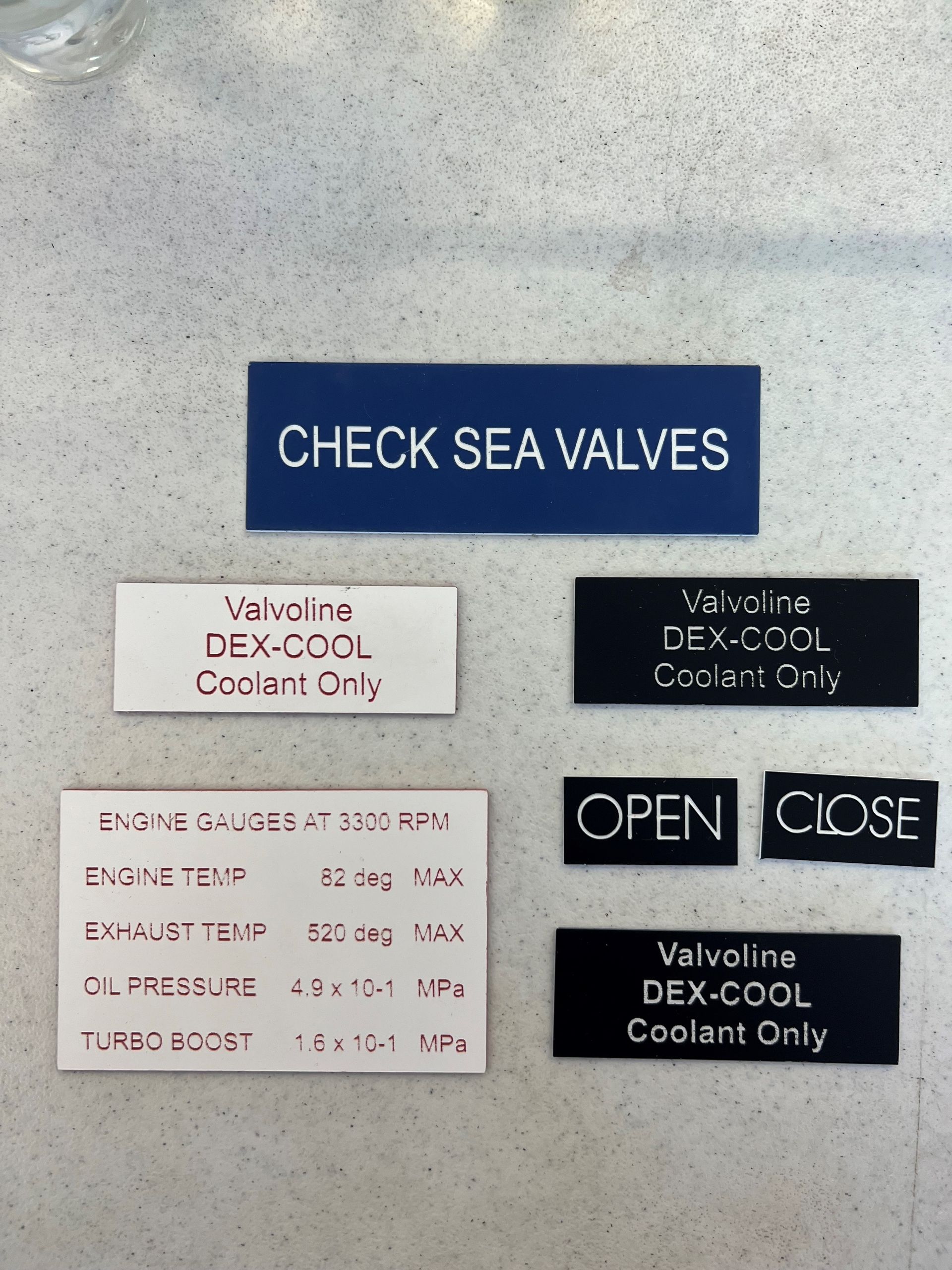 Blue ship control panel labeled “CHECK SEA VALVES” with open/close buttons and valve labels — Advanced Poly in Darwin, NT