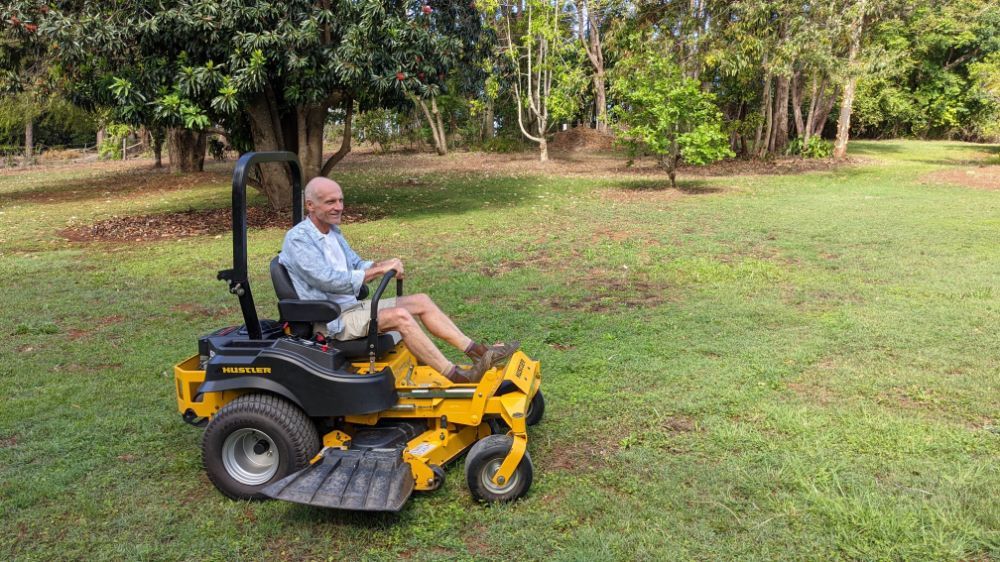 Man on Ride-on Mower — FarmCare In Byron Bay, NSW
