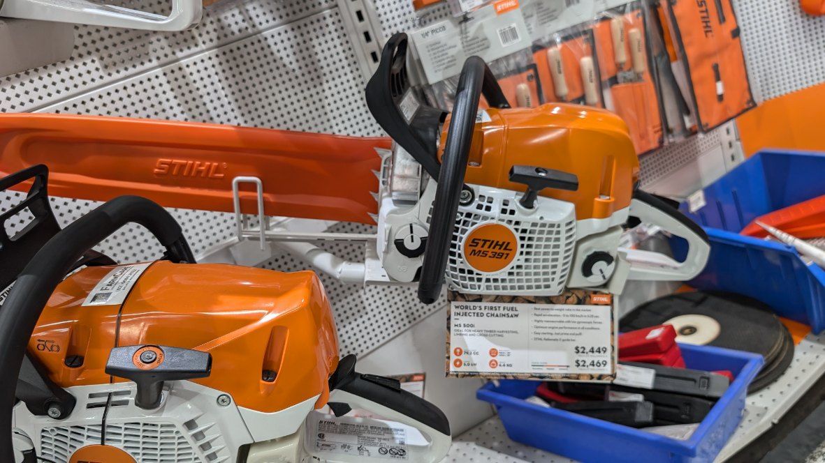 A Chainsaw is Sitting on Top of a Table in a Store — FarmCare in Mullumbimby, NSW