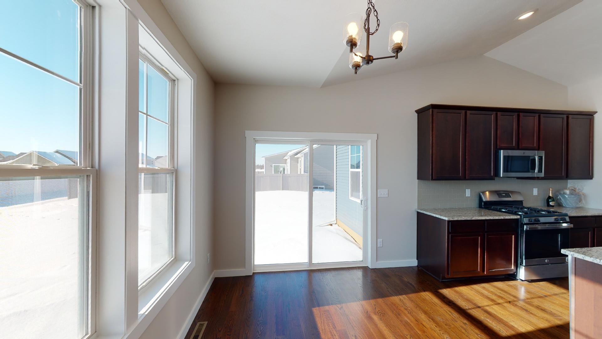dinette with sliding door to backyard
