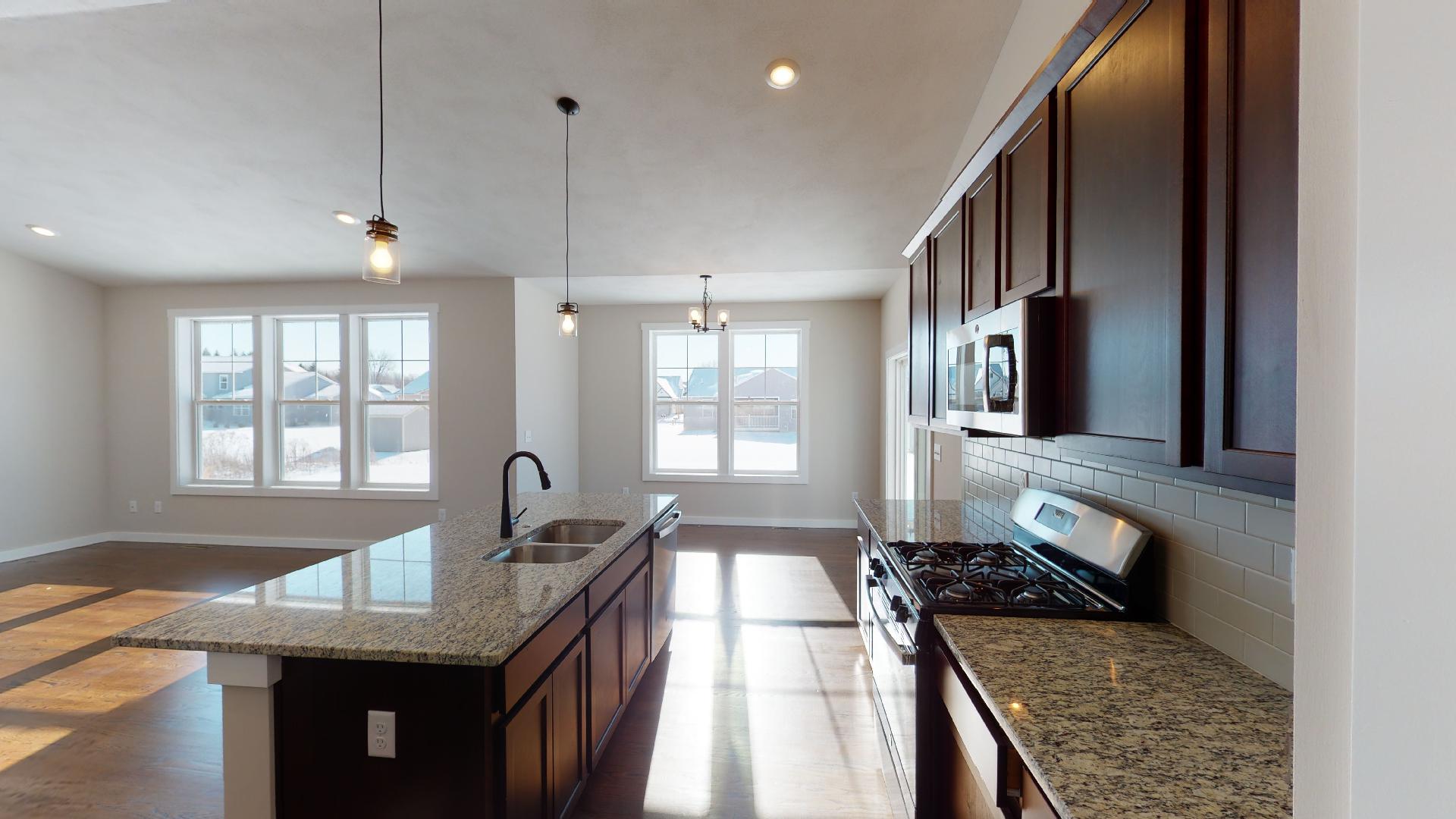 kitchen with living room and dinette in background