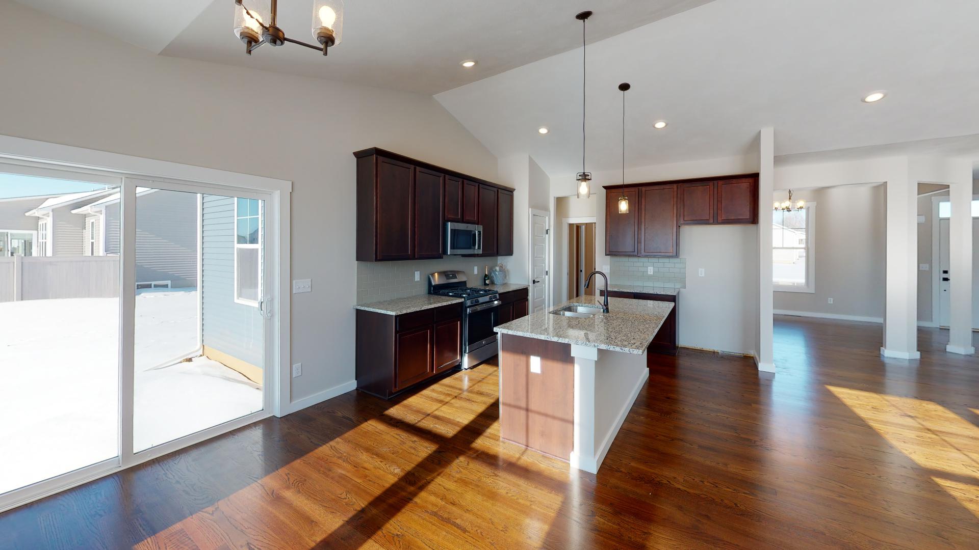 kitchen and dinette with patio access