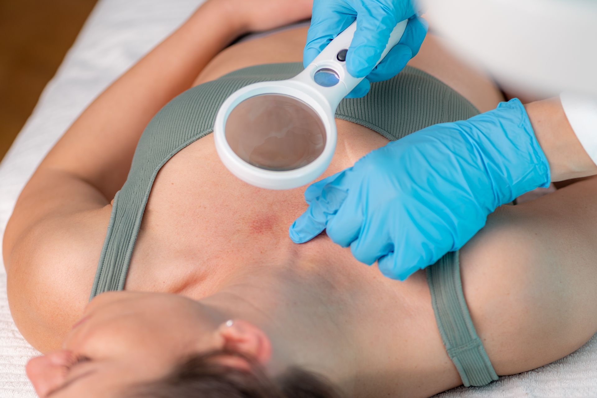 dermatologist examining skin