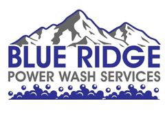 A logo for blue ridge power wash services with a mountain in the background