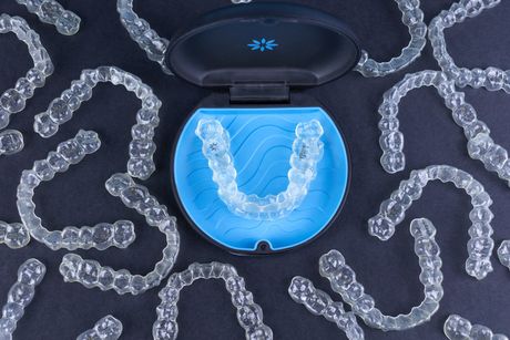 Invisalign clear aligner on table