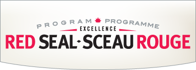 The Red Seal Program logo with text in red and black against a white background featuring a small Canadian maple leaf.