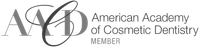 The american academy of cosmetic dentistry logo is black and white.