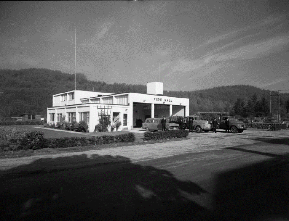 A black and white photo of a fire station
