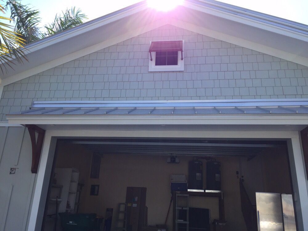 The sun is shining through the roof of a garage