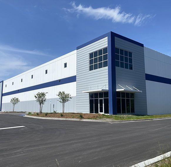 Steel warehouse builders in Spring Colorado constructing storage facility