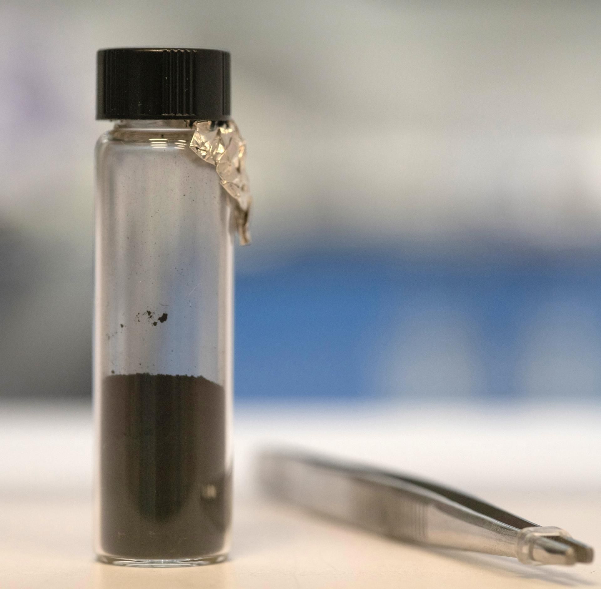 A vial holding material returned from the asteroid Bennu