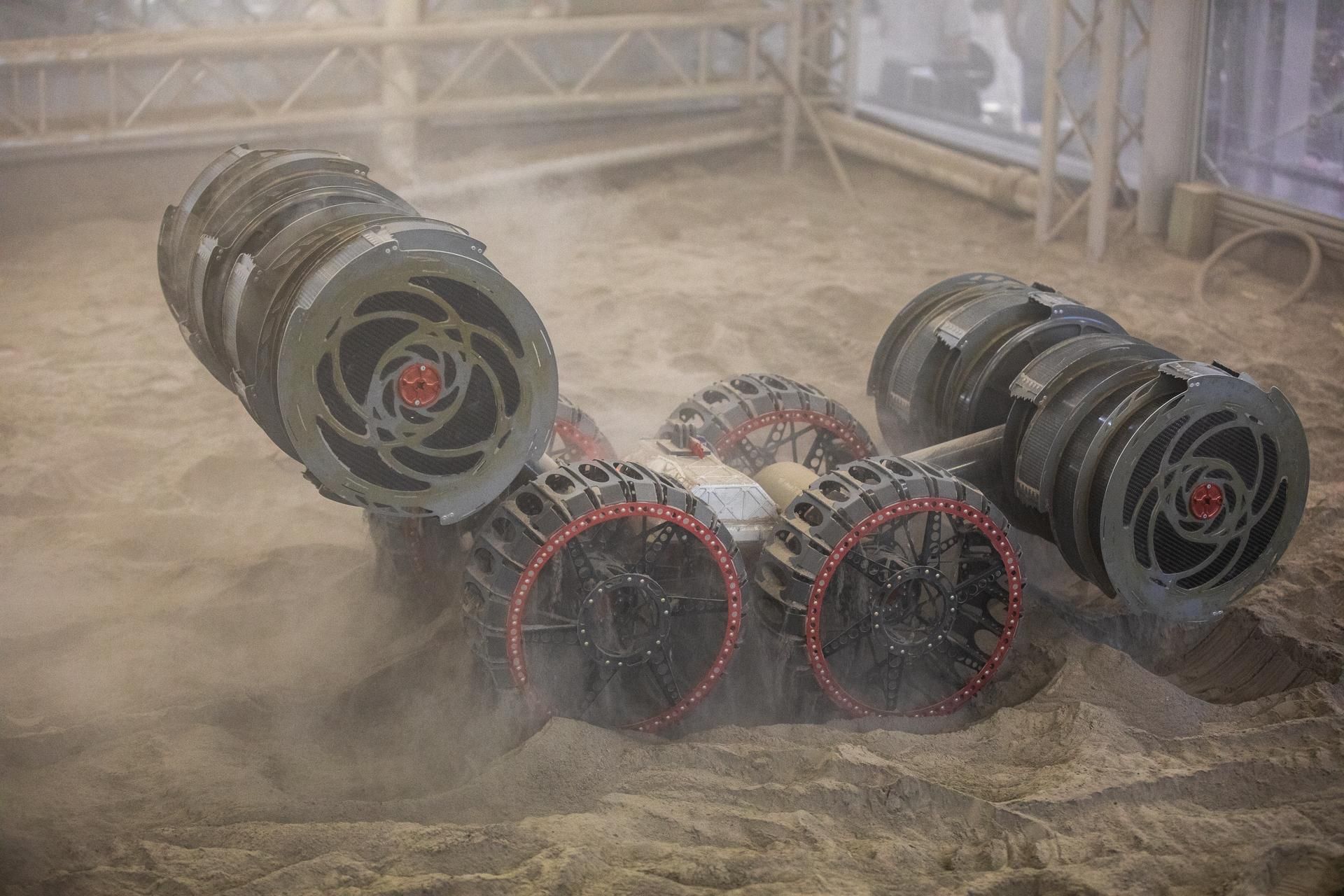 Bucket drums and drive wheels working through simulated lunar regolith