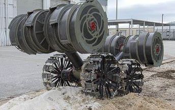 Hephaestus Industry low-gravity drive wheels built and staged outside the shop