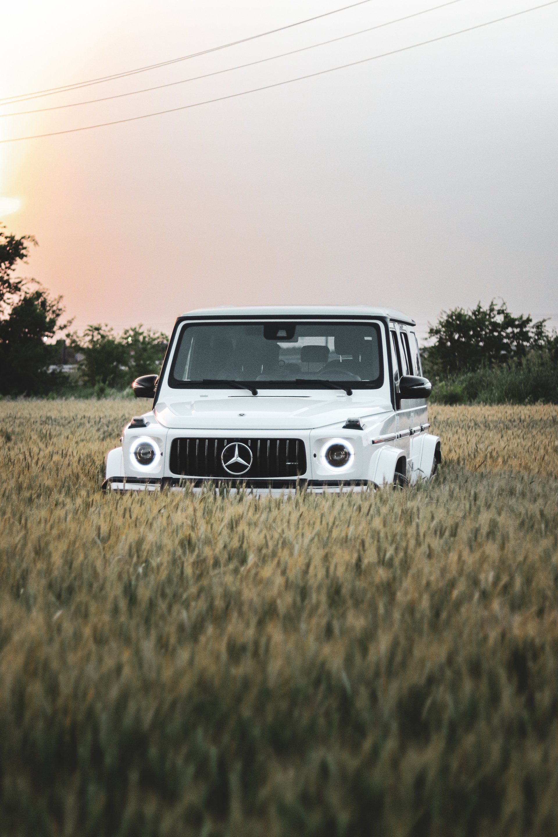 If you're looking for a luxurious, eye-catching ride, then look no further than the Mercedes G63. This white beauty is sure to turn heads whether you're driving down the street or pulling up to a red carpet event. The G63 comes equipped with all the amenities you could want, including a powerful engine, comfortable seats, and an impressive sound system. Whether you're renting it for a night on the town or for a longer vacation, the G63 is sure to make your trip unforgettable. So what are you waiting for? Rent the Mercedes G63 today and start living in the lap of luxury.