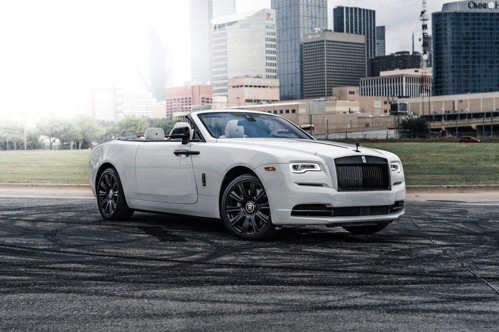The Rolls Royce Dawn is one of the most luxurious and exclusive cars on the market. If you're looking for a car that will make you feel like a king or queen, then this is the perfect choice. It's got all the bells and whistles, from a lavish interior to a powerful engine.