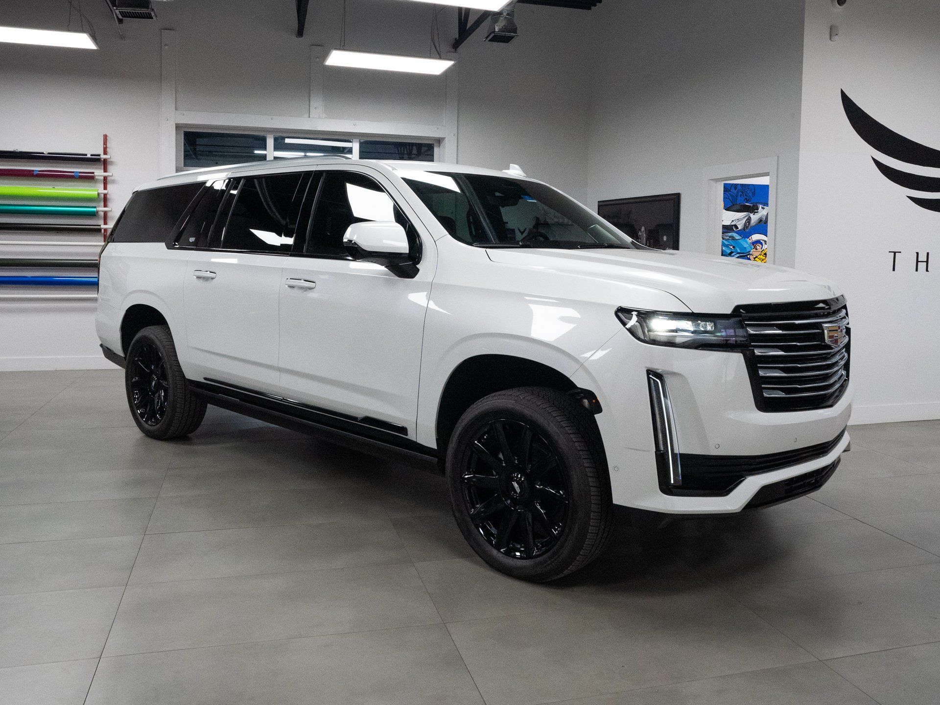 The Cadillac Escalade ESV is a true luxury SUV. It seats up to eight people, has a powerful V8 engine, and comes with all the bells and whistles you could want. Whether you're driving through town or hitting the open road, the Escalade ESV will make you feel like a king.