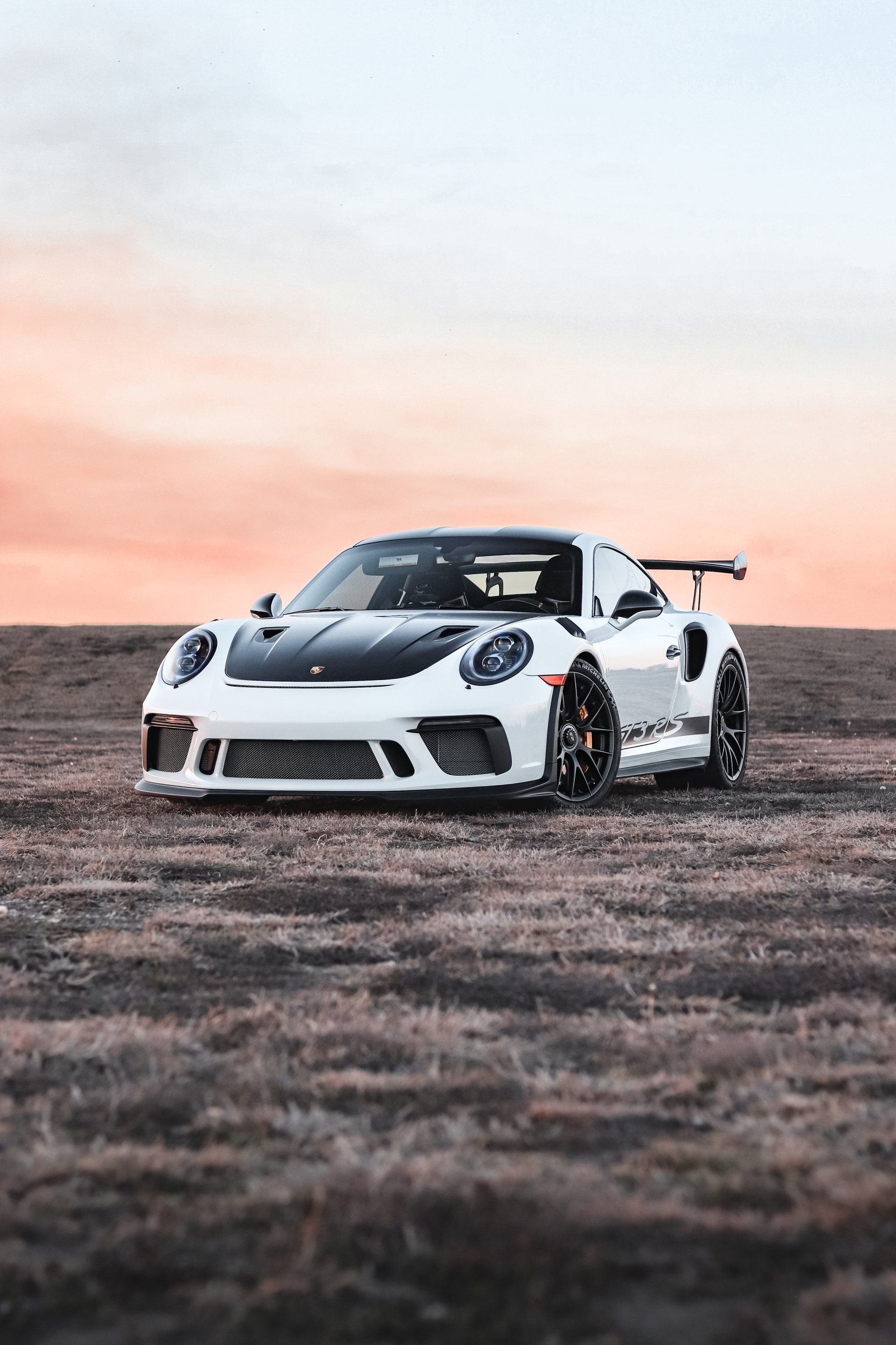 After a several year hiatus, the Porsche 911 GT3rs is finally back and it is cooler than ever. The new rs comes with a 4.0 liter flat-six engine that produces 500 horsepower and 339 lb-ft of torque. It is also one of the lightest cars in its class, weighing in at just 3,153 pounds. The result is a car that is extremely fast and nimble, making it a joy to drive on both the street and the track. In addition to its impressive performance, the 911 GT3rs also features a stunning design that is sure to turn heads. Whether you are looking for an exhilarating driving experience or simply want to show off your style, the 911 GT3rs is sure to impress.