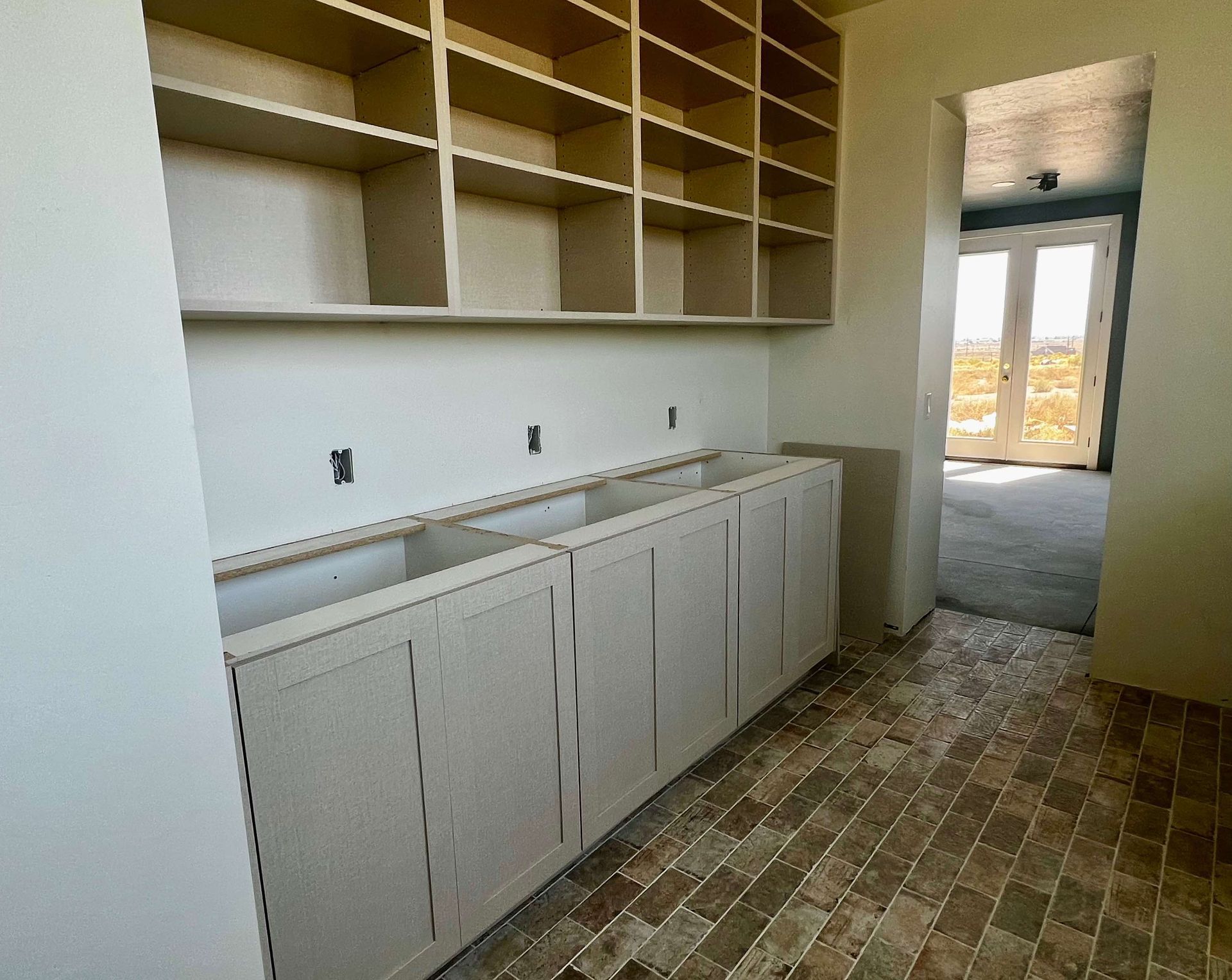 the open pantry of the ruby, a custom home in milford Utah, during construction