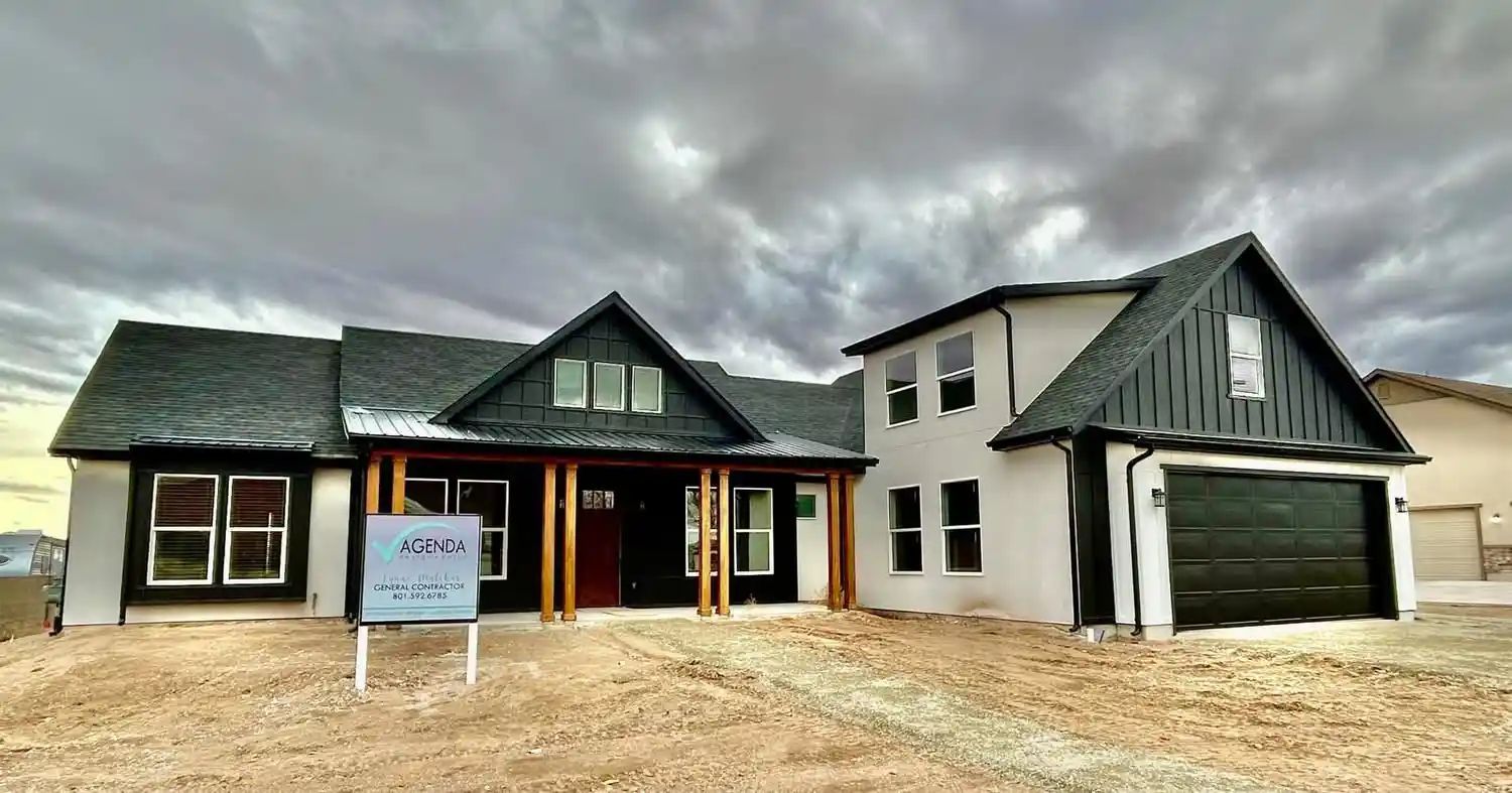 Stones Throw,  with a for sale sign in front of it.