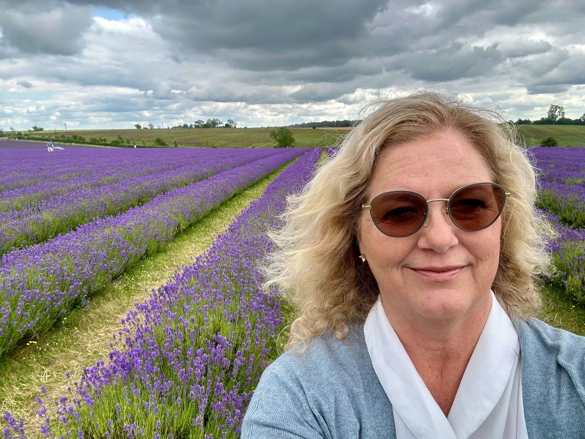 Lynae Malchus, owner and ceo in a field of lavender