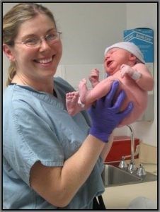 Medical Staff Holding A Baby – Libby, MO – Northwest Community Health Medical Staff Holding A Baby – Libby, MO – Northwest Community Health