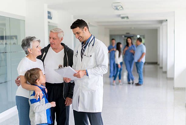 Primary healthcare provider serving Thompson Falls, MT, consulting with patients in the hospital